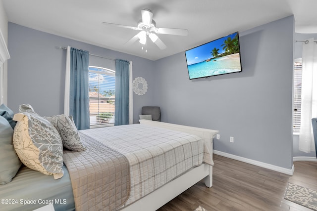 bedroom featuring ceiling fan and wood-type flooring