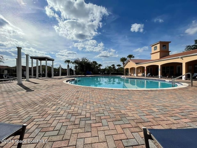 view of pool with a patio