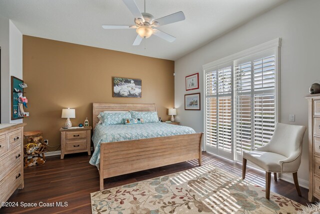 bedroom featuring dark hardwood / wood-style floors and ceiling fan