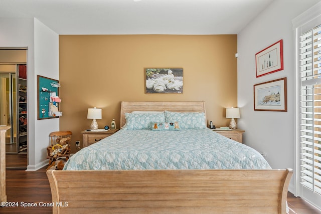 bedroom featuring dark wood-type flooring