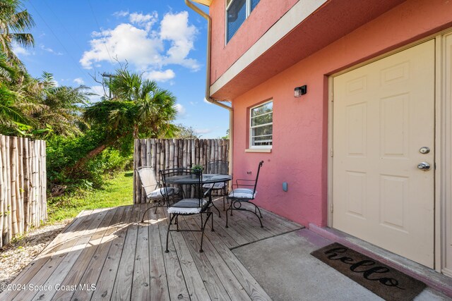 13433 Heald Ln Unit 1, Fort Myers, FL 33908 - deck featuring outdoor dining space