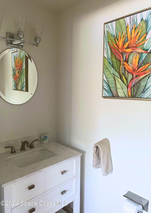 bathroom featuring vanity and ceiling fan