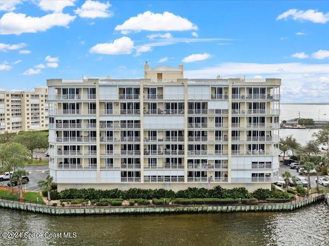 view of building exterior featuring a water view