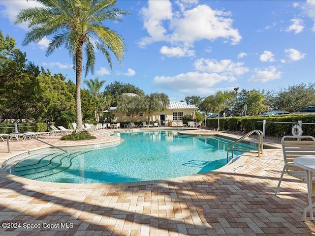 view of pool with a patio