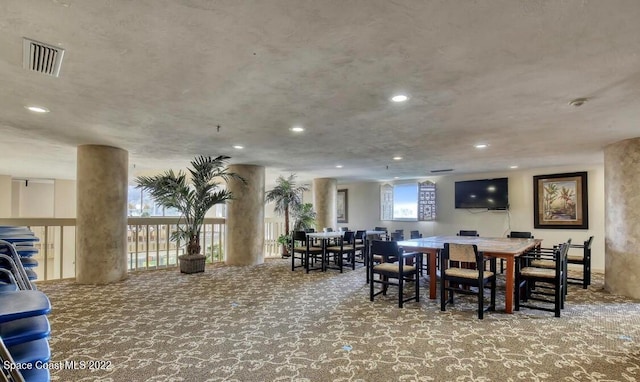 view of carpeted dining area