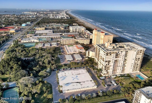 aerial view with a view of the beach and a water view