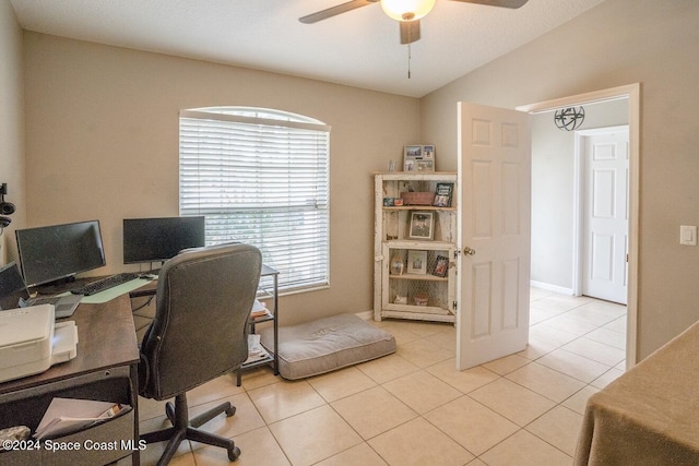 office area featuring light tile patterned floors and ceiling fan