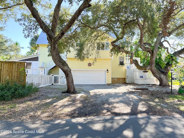 view of front of property featuring a garage