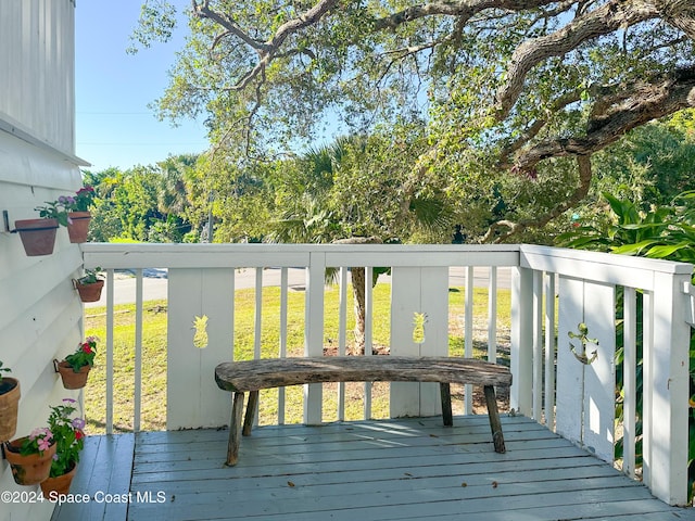 5875 Riverside Dr, Melbourne Beach, FL 32951 - deck featuring a yard