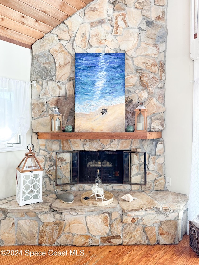 5875 Riverside Dr, Melbourne Beach, FL 32951 - detailed view of a stone fireplace and wood finished floors