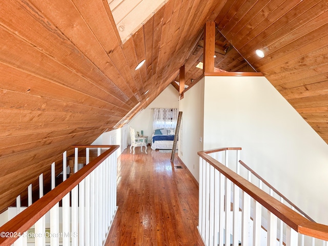 5875 Riverside Dr, Melbourne Beach, FL 32951 - corridor with an upstairs landing, wood ceiling, lofted ceiling, and hardwood / wood-style floors