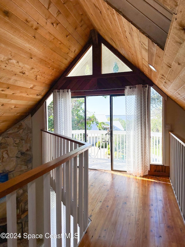 5875 Riverside Dr, Melbourne Beach, FL 32951 - bonus room with vaulted ceiling, wooden ceiling, and hardwood / wood-style flooring