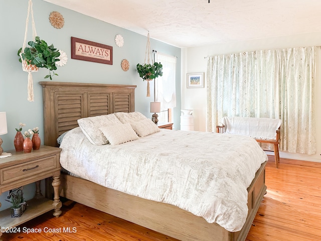 bedroom featuring light hardwood / wood-style floors