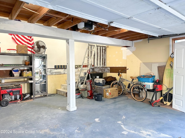 5875 Riverside Dr, Melbourne Beach, FL 32951 - garage with a garage door opener
