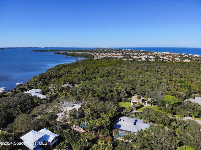 5875 Riverside Dr, Melbourne Beach, FL 32951 - aerial overview of property's location with a large body of water and a heavily wooded area