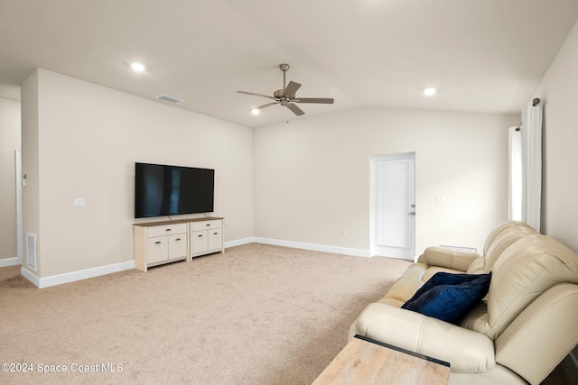 carpeted living room featuring ceiling fan and vaulted ceiling