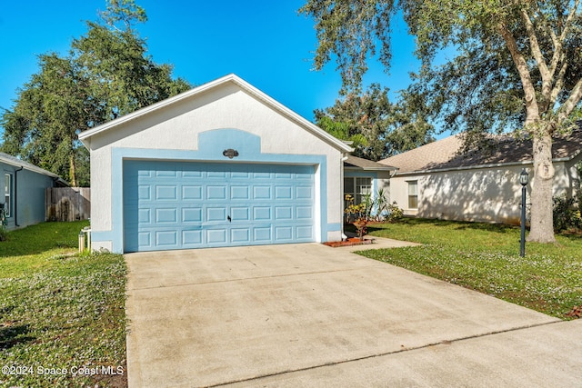 garage with a yard