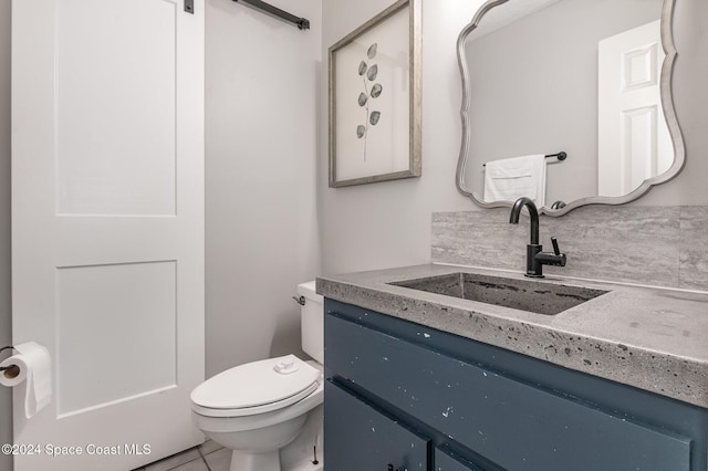 1010 Citrus Ave NE, Palm Bay, FL 32905 - bathroom with vanity and toilet