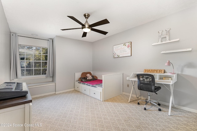 bedroom featuring light carpet and ceiling fan