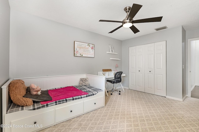 1010 Citrus Ave NE, Palm Bay, FL 32905 - carpeted bedroom featuring a closet and a ceiling fan