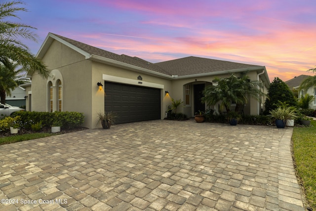 view of front of home featuring a garage