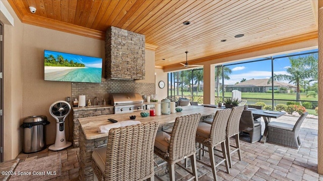 kitchen with ornamental molding, backsplash, and wooden ceiling