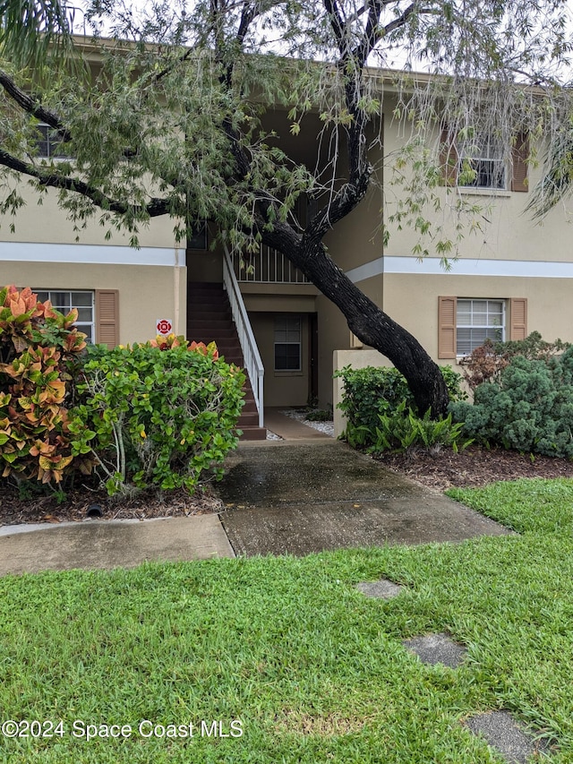 exterior space with a front yard