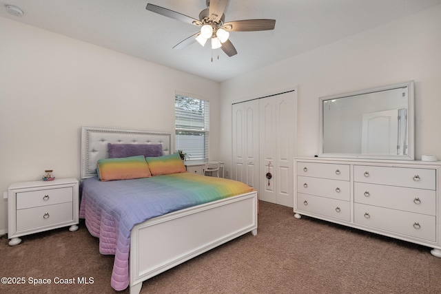 carpeted bedroom with a closet and ceiling fan