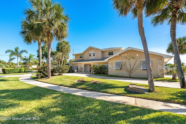 view of front of house featuring a front yard