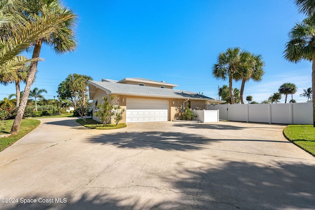 view of property exterior featuring a garage