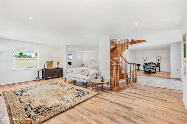 living room with light hardwood / wood-style flooring