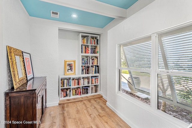 living area with light hardwood / wood-style flooring