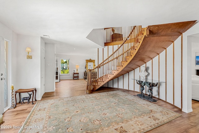 foyer with light hardwood / wood-style flooring