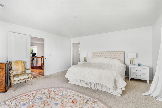 bedroom with light carpet