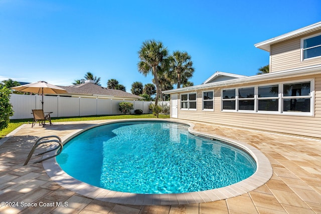 view of pool with a patio area