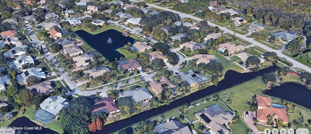 aerial view featuring a water view