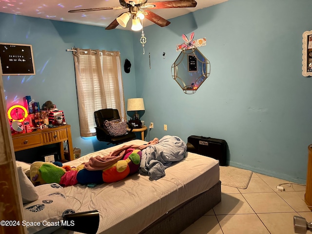 bedroom featuring ceiling fan and light tile patterned floors