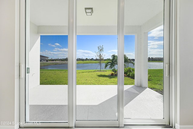 entryway with a water view