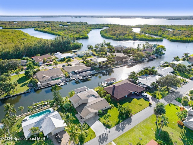 drone / aerial view with a water view