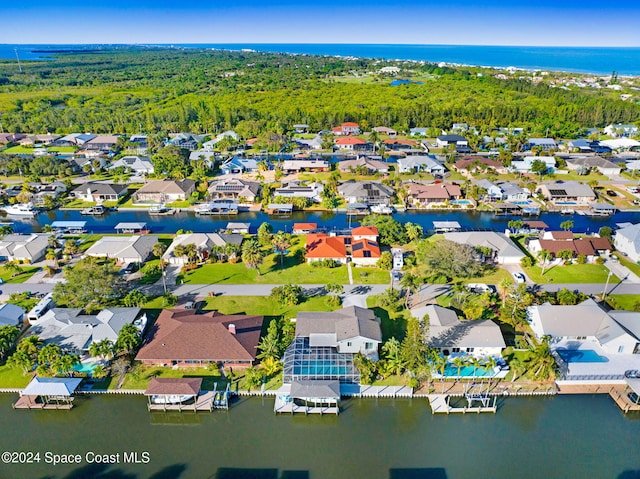 379 Hiawatha Way, Melbourne Beach, FL 32951 - aerial perspective of suburban area featuring a nearby body of water