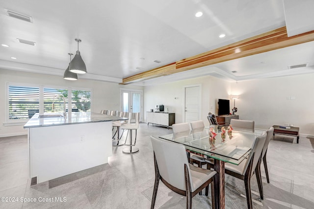 379 Hiawatha Way, Melbourne Beach, FL 32951 - dining area with recessed lighting, a raised ceiling, and crown molding