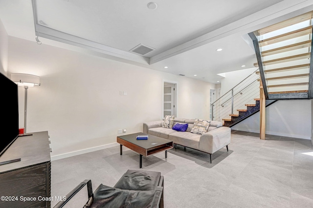 379 Hiawatha Way, Melbourne Beach, FL 32951 - living room featuring stairway, recessed lighting, and a tray ceiling