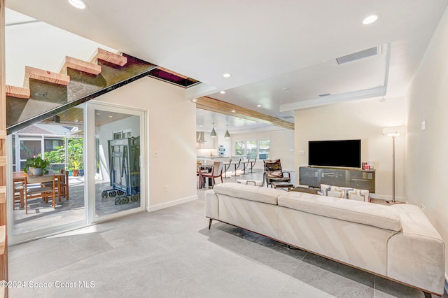 living room featuring a wealth of natural light