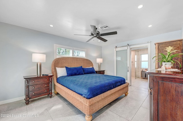 379 Hiawatha Way, Melbourne Beach, FL 32951 - bedroom with a barn door, recessed lighting, ceiling fan, and light tile patterned floors