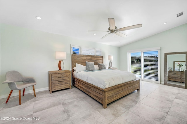 tiled bedroom with ceiling fan and lofted ceiling