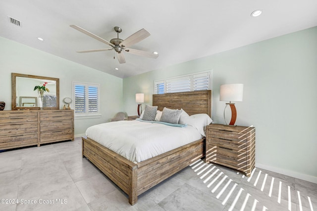 bedroom featuring ceiling fan and vaulted ceiling