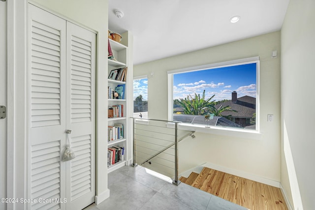 hallway featuring light hardwood / wood-style flooring