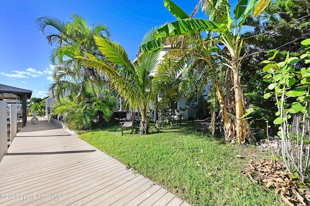 379 Hiawatha Way, Melbourne Beach, FL 32951 - exterior space featuring a yard