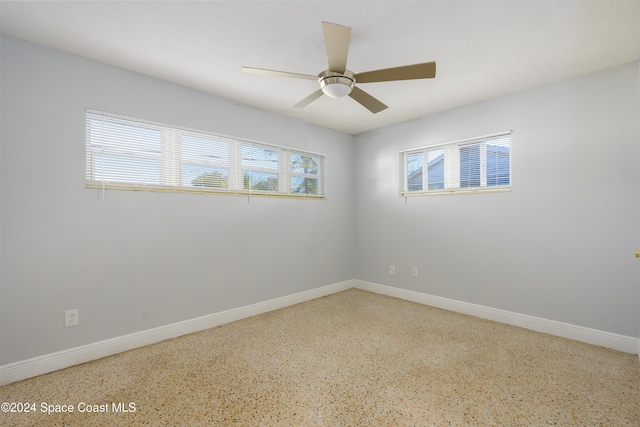 empty room featuring ceiling fan