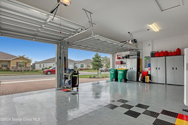 garage featuring a garage door opener